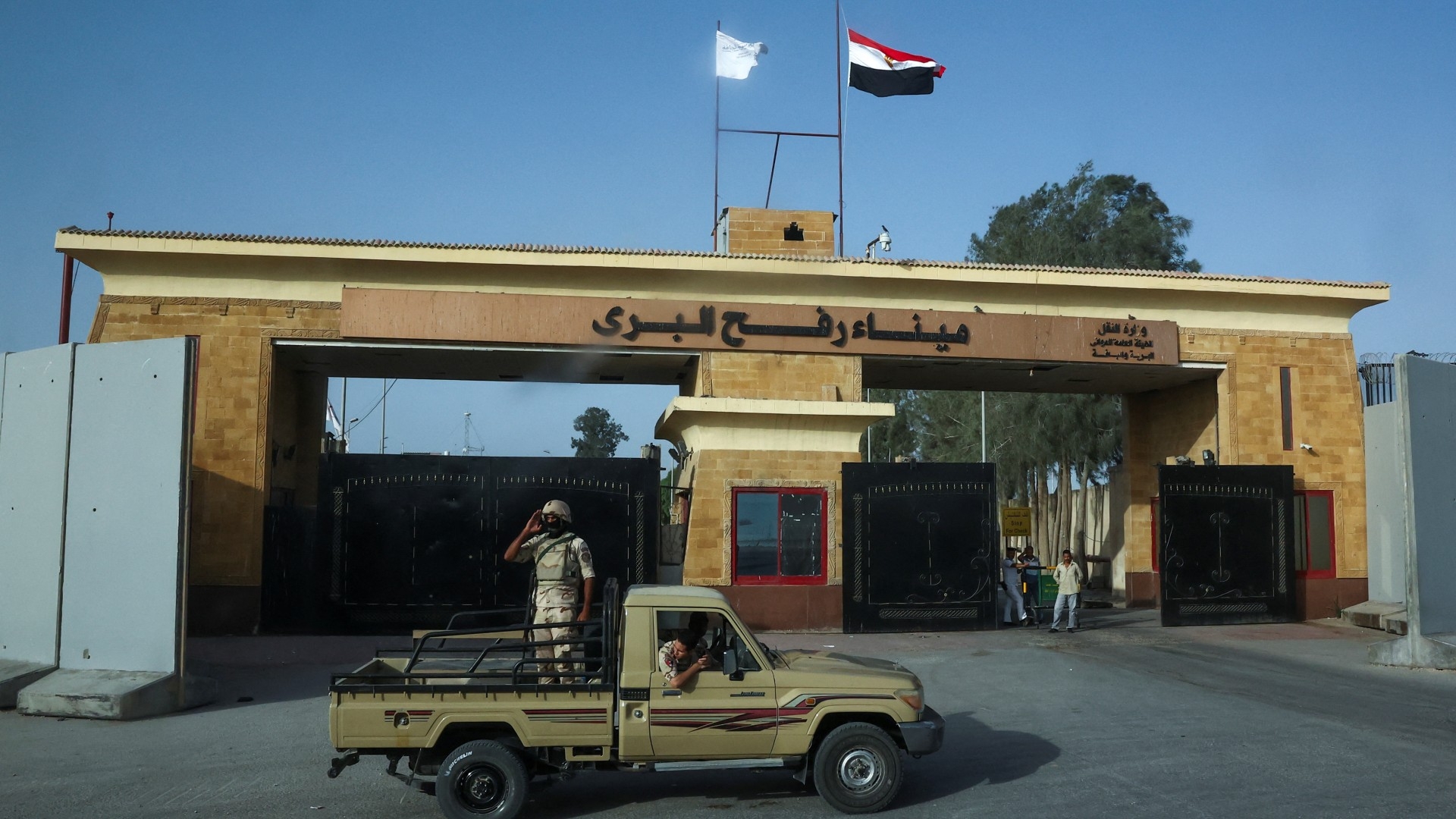 Egyptian soldiers stand guard near the Rafah Crossing at the Egypt-Gaza border, in Rafah, Egypt, 4 July (Reuters/Amr Alfiky)