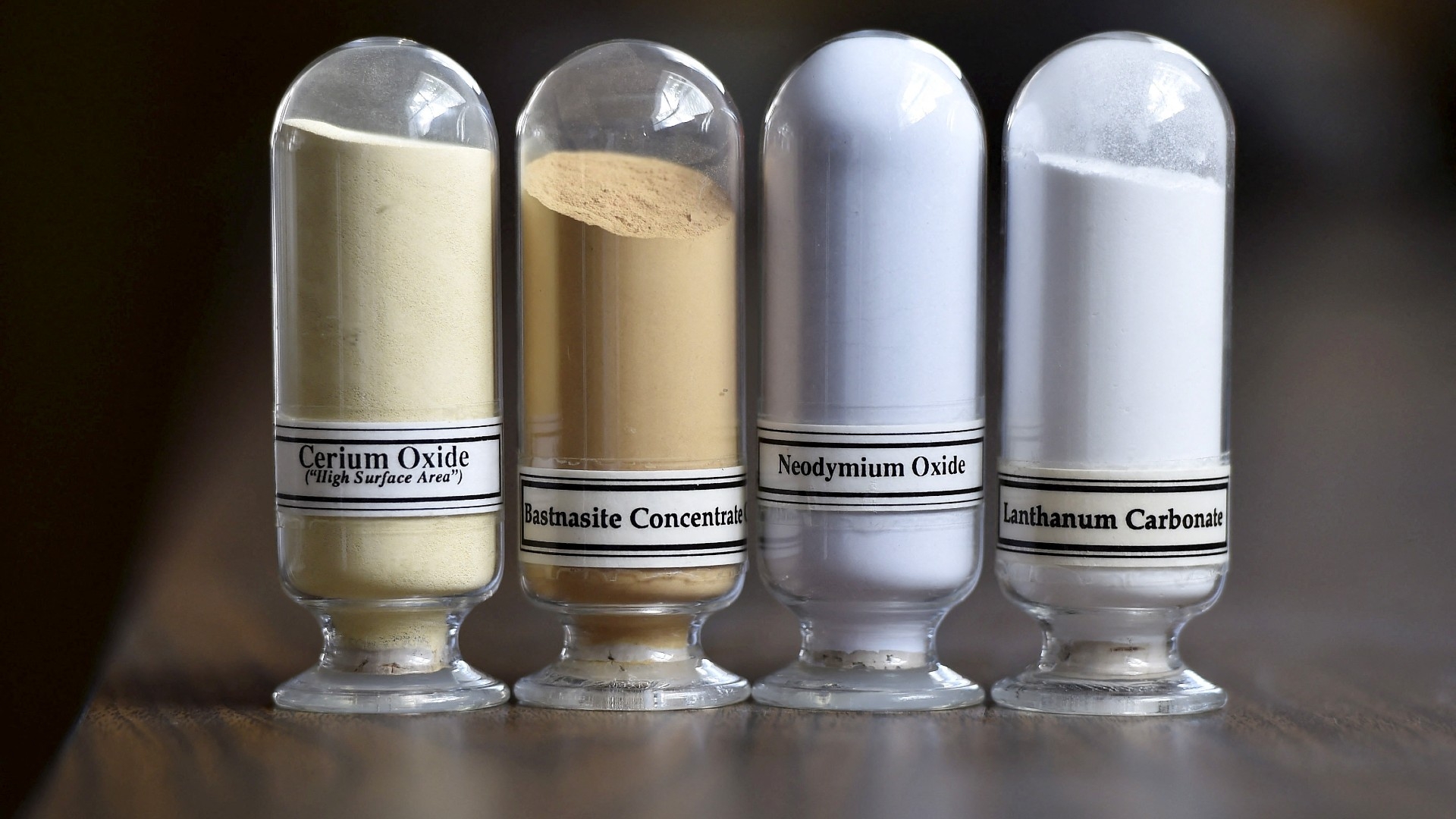 Samples of rare earth minerals Cerium oxide, Bastnasite, Neodymium oxide and Lanthanum carbonate on display (Reuters/David Becker/file photo)