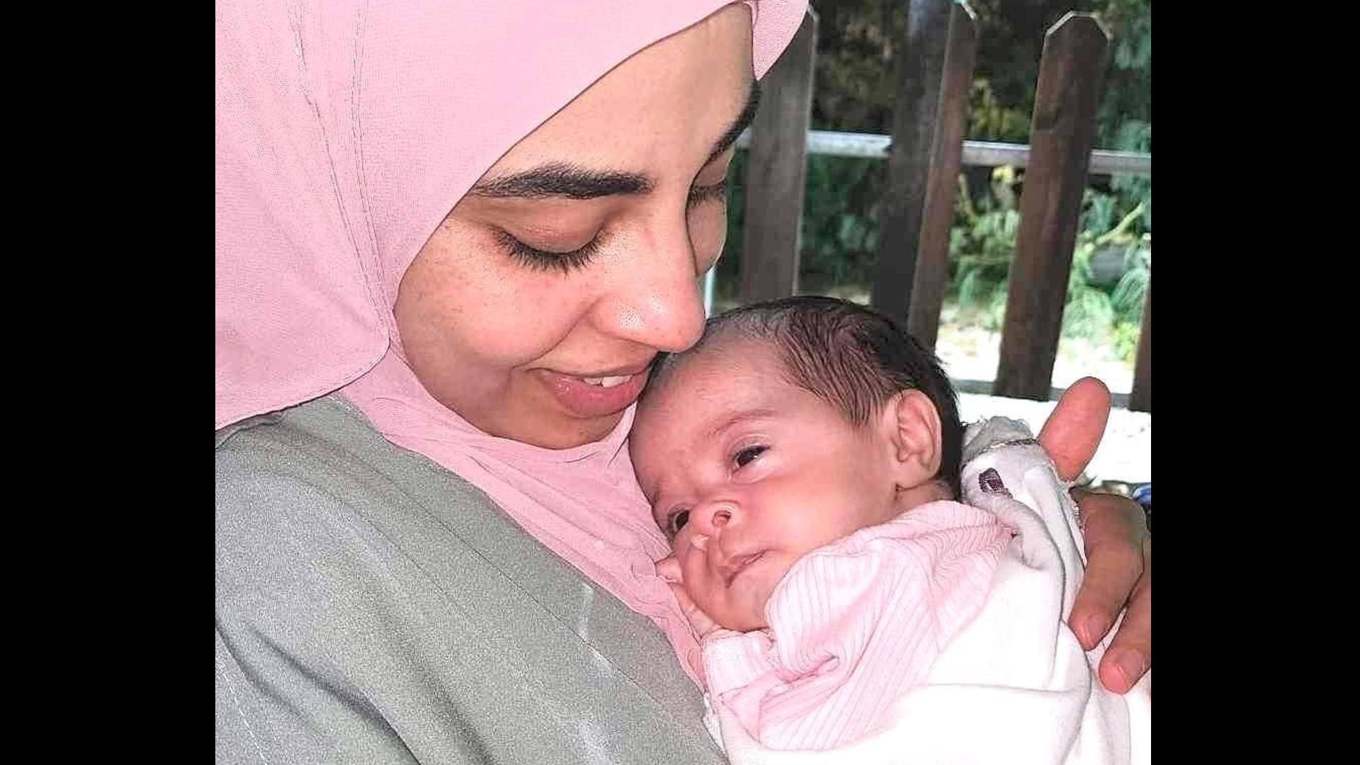 Palestinian journalist Rula Hassanein, 29, who was detained by Israeli forces on 19 March, with her baby daughter Elia (Supplied)