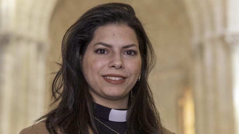 Sally Ibrahim Azar, the first female pastor in the Holy Land of the Lutheran Church, poses for a picture at the Lutheran Church in the Jerusalem's Old City (AFP)