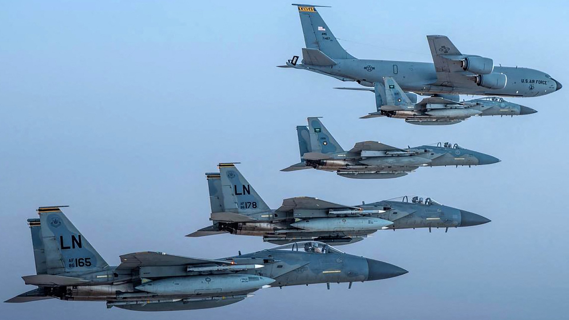 Saudi F-15 fighter jets fly in formation with their US Air Force counterparts on 2 June 2019.