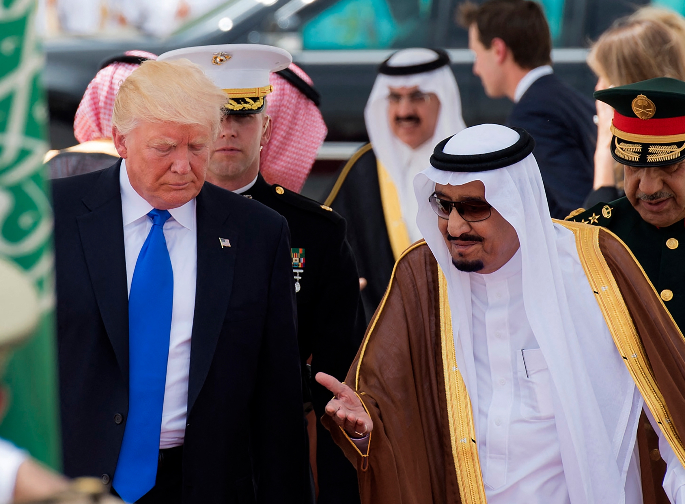 US President Donald Trump and Saudi King Salman bin Abdulaziz al-Saud take part in an arrival ceremony at the Saudi Royal Court in Riyadh on 20 May 2017.