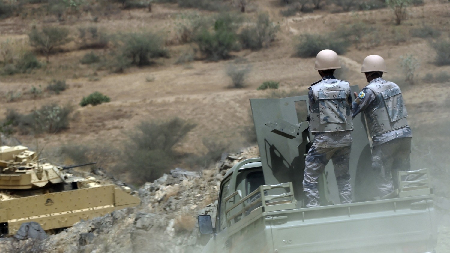 Members of the Saudi border guard and army's armoured personnel carrier patrol the Saudi-Yemeni border in southwestern Saudi Arabia, on 9 April 2015.