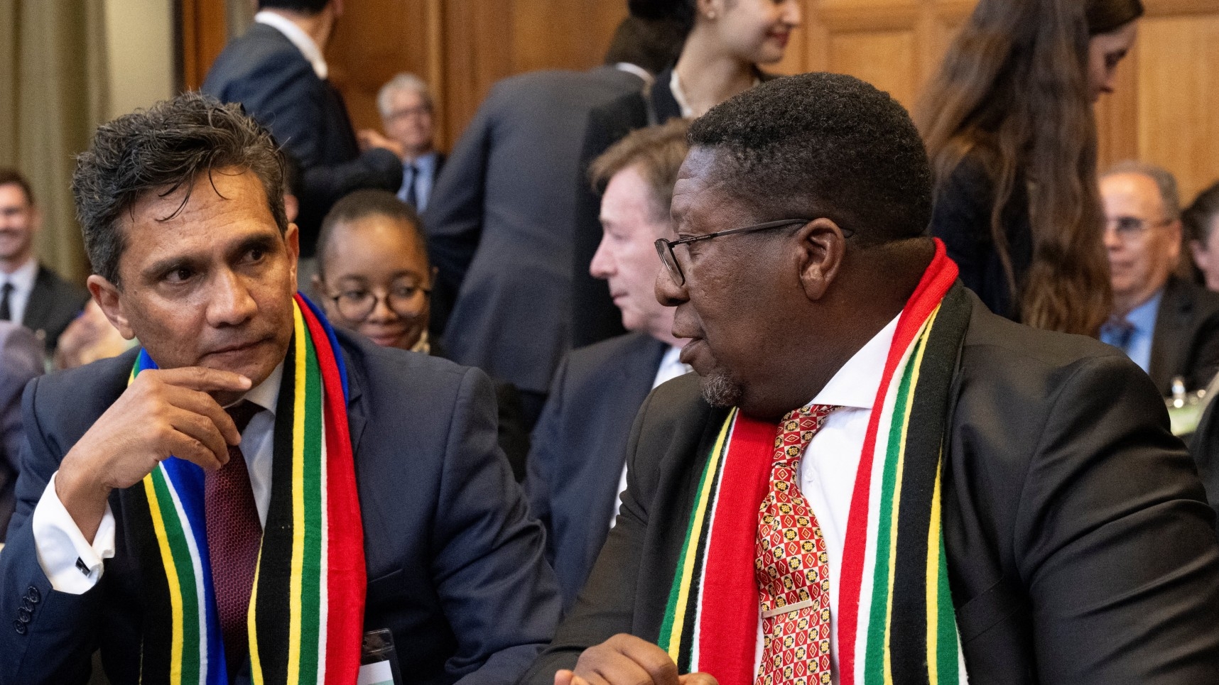 Director General of the Department of International Relations and Cooperation Zane Dangor (L) and South African ambassador to the Netherlands Vusimuzi Madonsela (R) are seen after presenting their arguments to the International Court of Justice (ICJ) as part of South Africa case against Israel in The Hague, on 16 May 2024 (AFP)