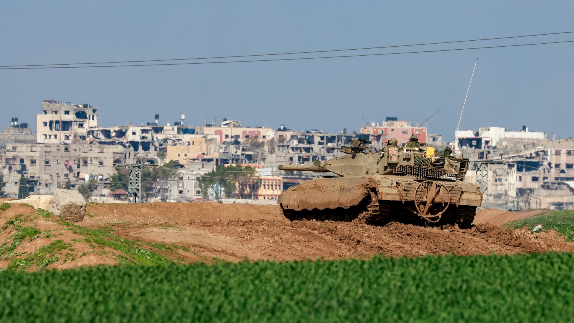 A picture taken from a position in southern Israel overlooking the Gaza Strip on 5 February 2024 (AFP/Menahem Kahana)