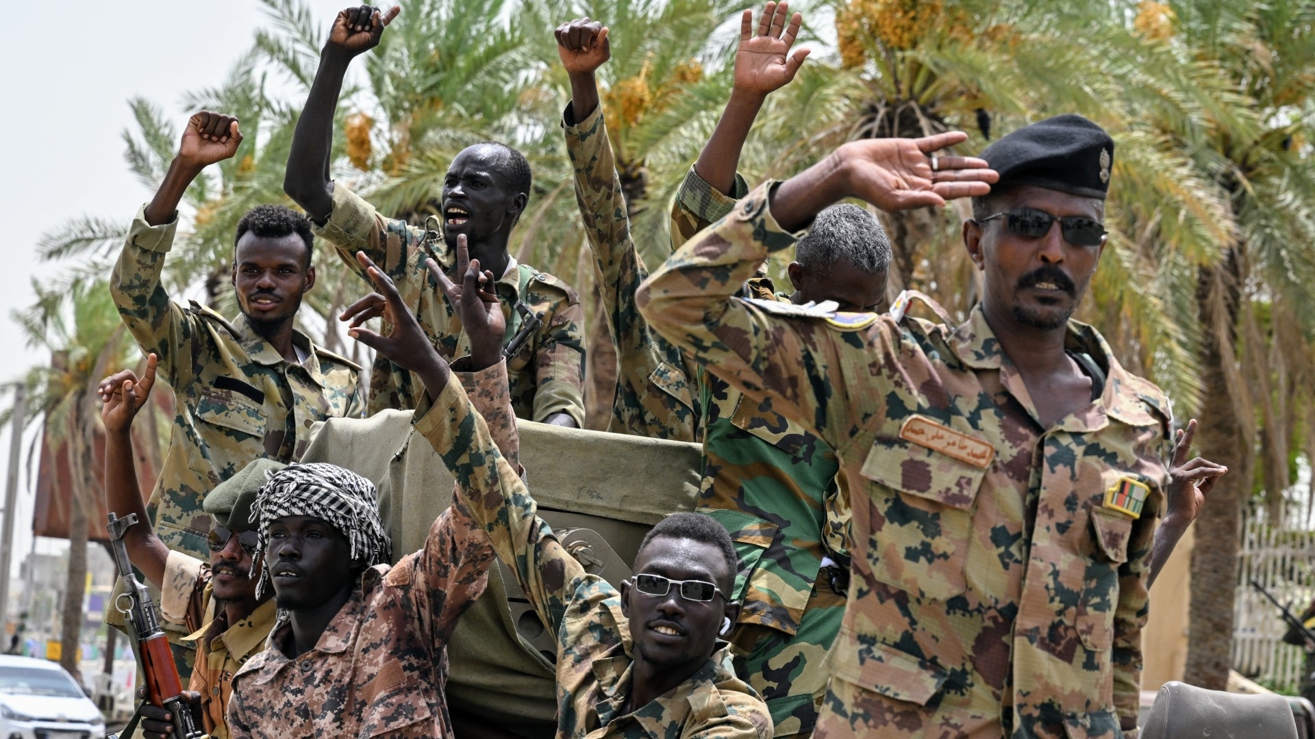 Members of Sudan's armed forces take part in a military parade held on the occasion of Army Day outside the Armed Forces Officers' Club in Port Sudan on 14 August 2024 (AFP)