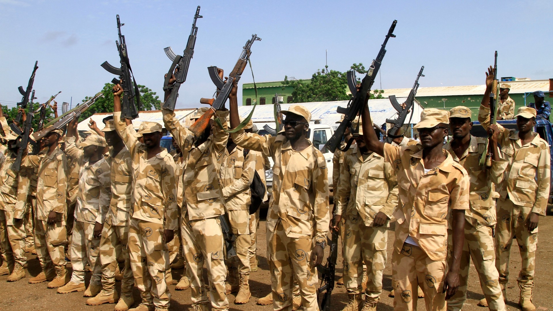 New members of Sudan's Gedaref State Police Department attend a graduation ceremony in Gedaref city in the east of the war-torn country, on 5 September 2024 (AFP)