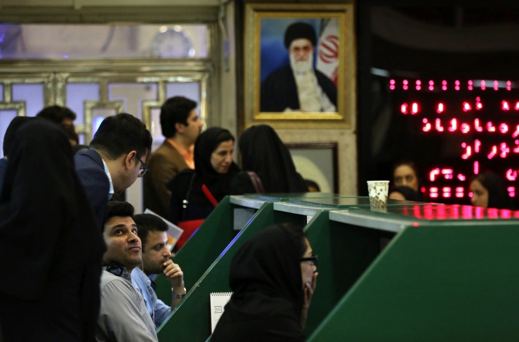 Iranian traders work at Tehran Stock Exchange on 1 July 2019.
