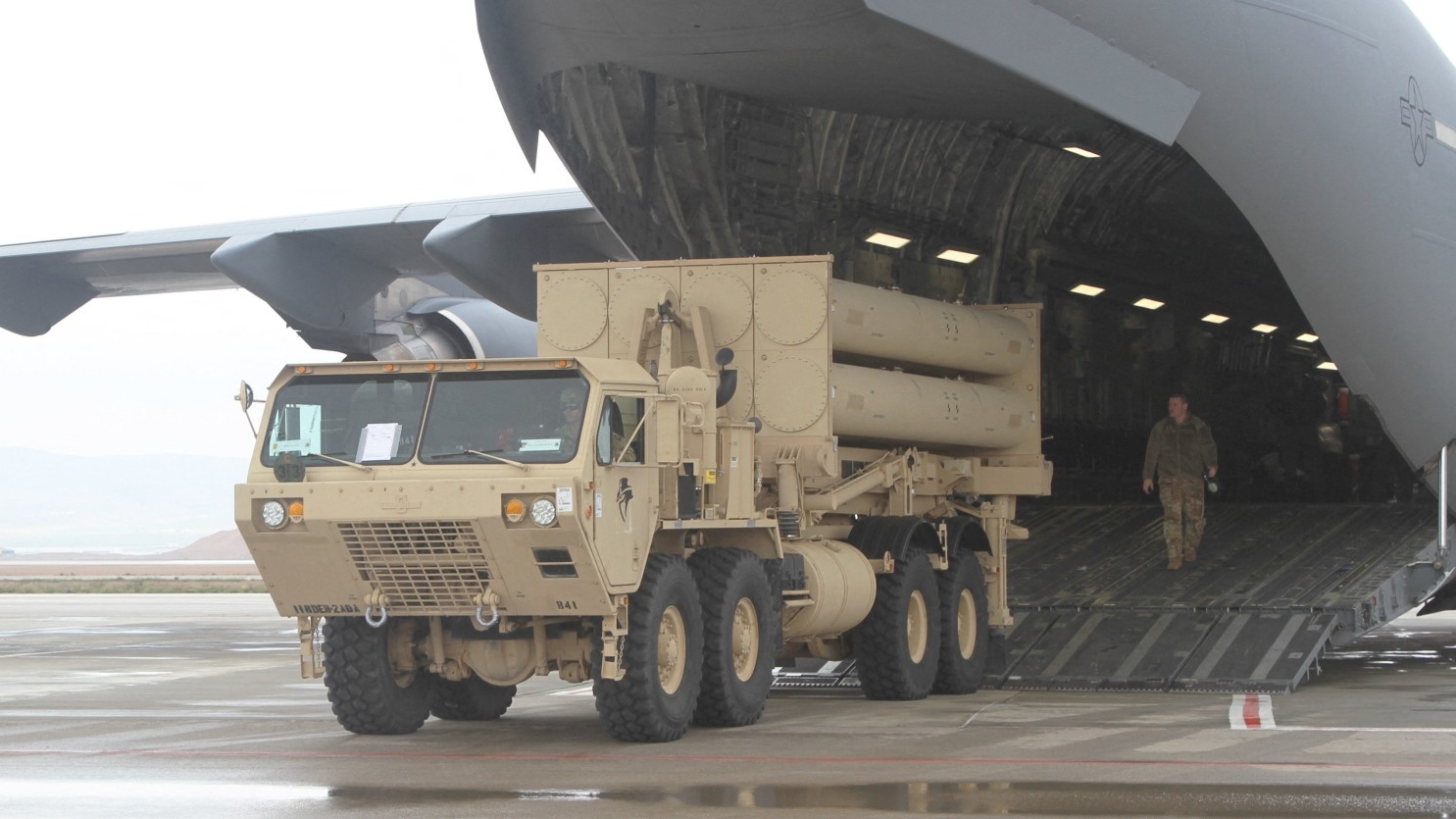 A US Air Force Airmen offloads a Thaad launcher from a C-17 Globe Master III at Nevatim Air Base, Israel, on 1 March 2019.