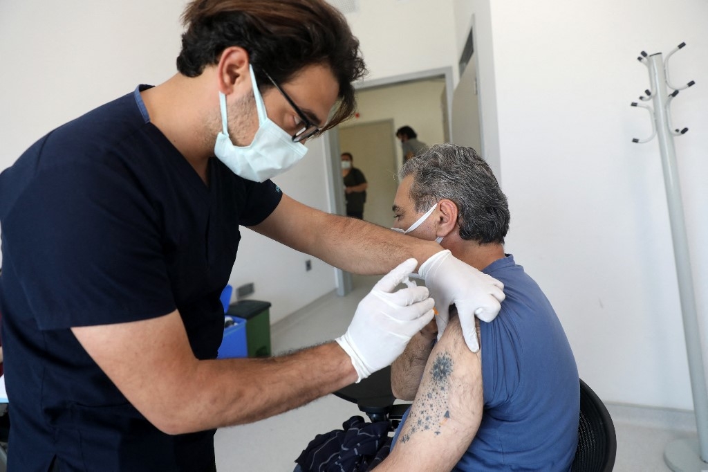 A man receives a dose of Pfizer BioNTech vaccine against Covid-19 in Ankara, Turkey, on 7 June 2021.