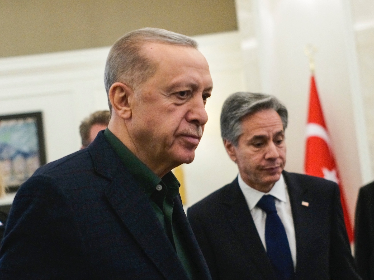 Turkish President Recep Tayyip Erdogan (L) talks to US Secretary of State Antony Blinken during their meeting at Esenboga airport in Ankara on February 20, 2023. (AFP)