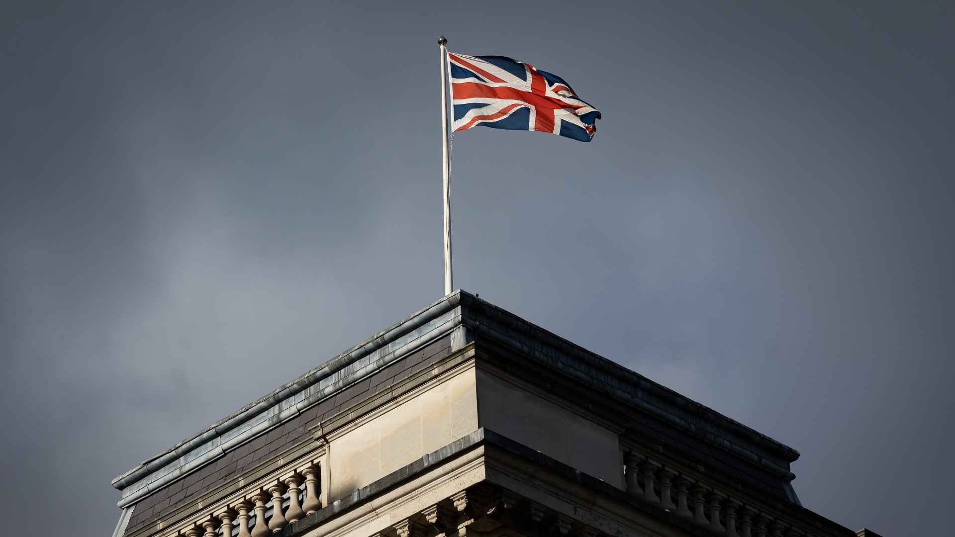 A Union Jack flag flies from a mast atop of the Foreign Office after the State Opening of Parliament in London (Reuters/Tejas Sandhu/SOPA Images/Sipa USA)