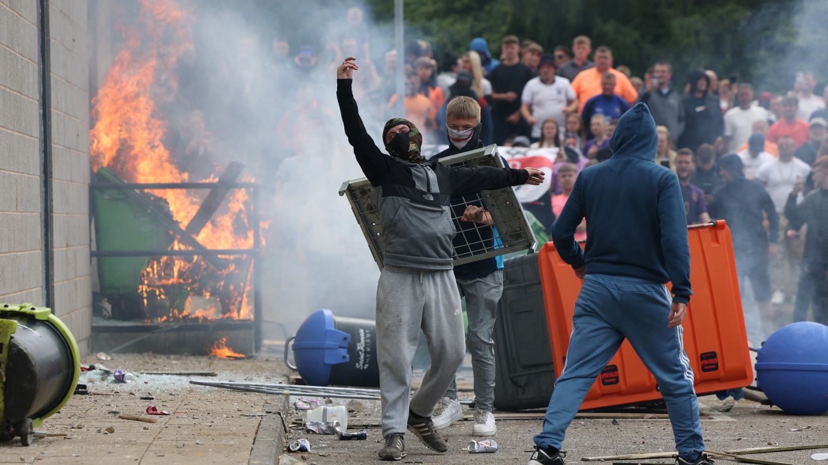 Far-right rioters stormed the Holiday Inn Express in Rotherham on 4 August 2024, after smashing its windows and setting a bin on fire (Hollie Adams/Reuters)