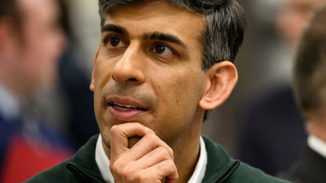 British Prime Minister Rishi Sunak is pictured in Bristol on 14 March 2024 (Leon Neal/Pool/AFP)