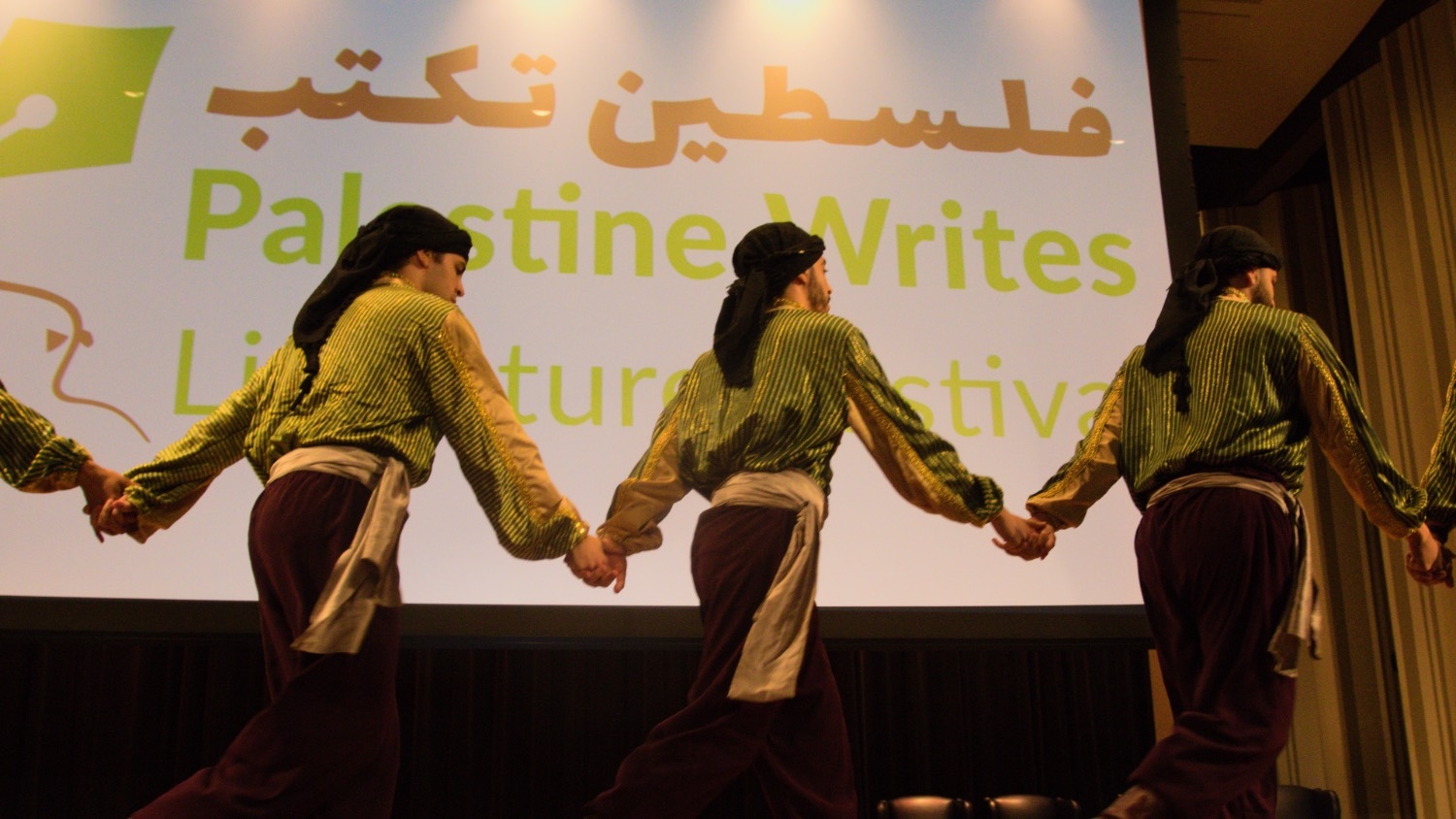 A dabke troupe performs during the opening day of the Palestine Writes literature festival.