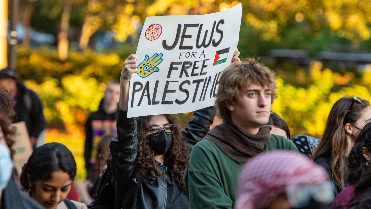 A protester holds a "Jews for Free Palestine" sign at a rally to support Palestine at the Massachusetts Institute of Technology in Cambridge, Massachusetts on 19 October 2023.