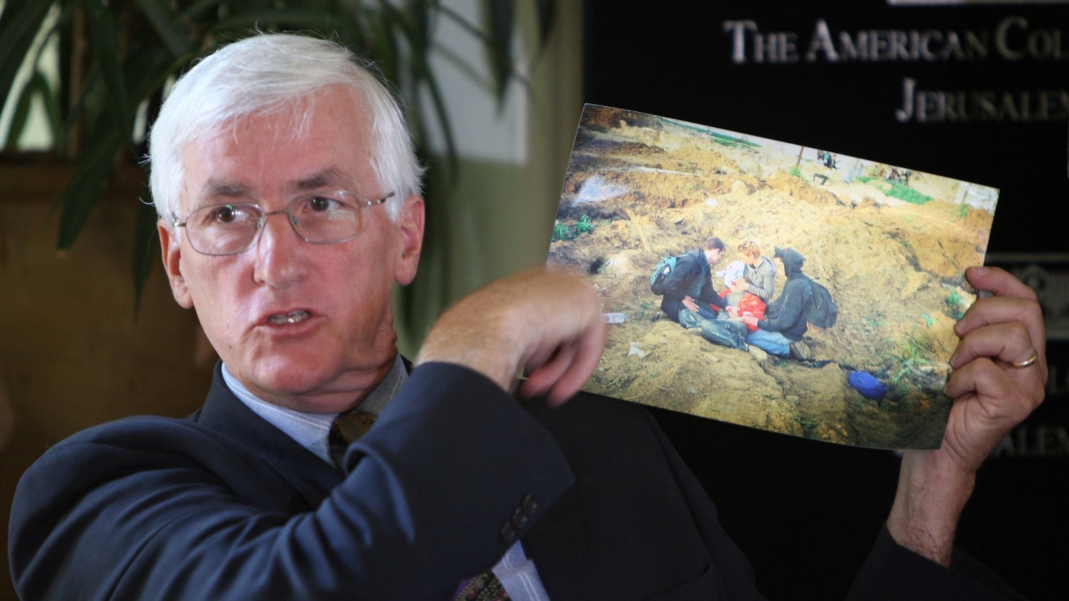 Craig Corrie, the father of US peace activist Rachel Corrie, displays a picture from the site where Rachel was killed during a press conference at an east Jerusalem hotel on 11 July 2011.
