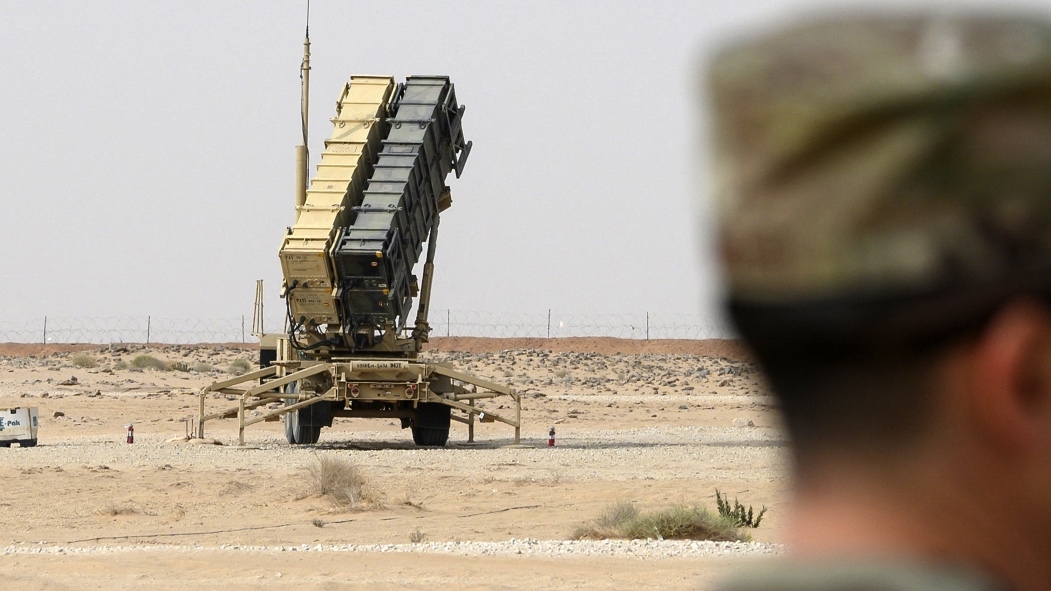 A member of the US Airforce looks on near a Patriot missile battery at the Prince Sultan air base in Al-Kharj, in central Saudi Arabia on 20 February 2020.