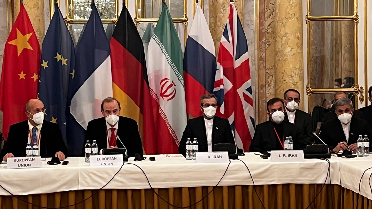A handout photo released on 3 December 2021 by the EU delegation in Vienna shows representatives from Iran and the EU attending the nuclear negotiations in Austria.
