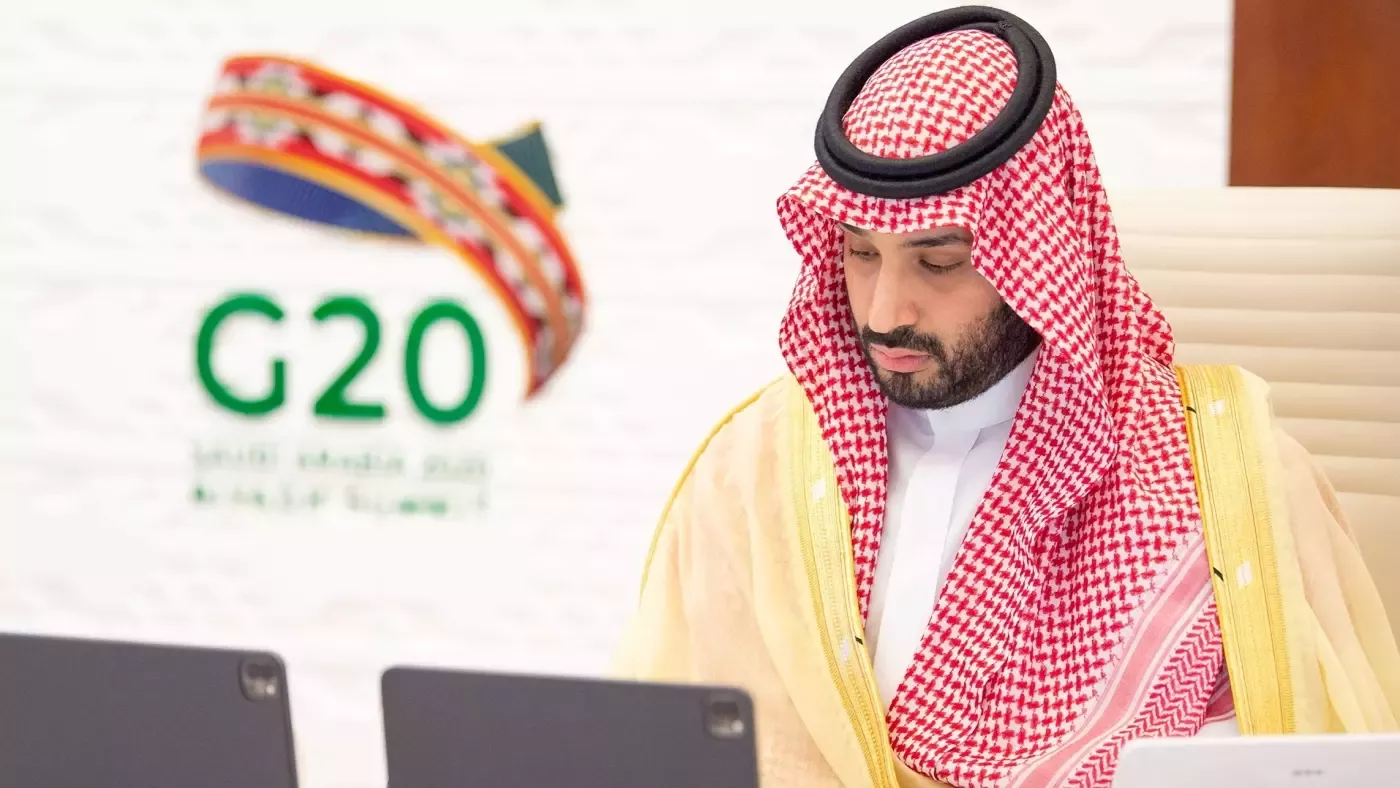 Saudi Crown Prince Mohammed bin Salman looking at his iPads during the 15th annual G20 Leaders' Summit in Riyadh, Saudi Arabia, 22 November 2020 (Saudi Royal Court/via Reuters)