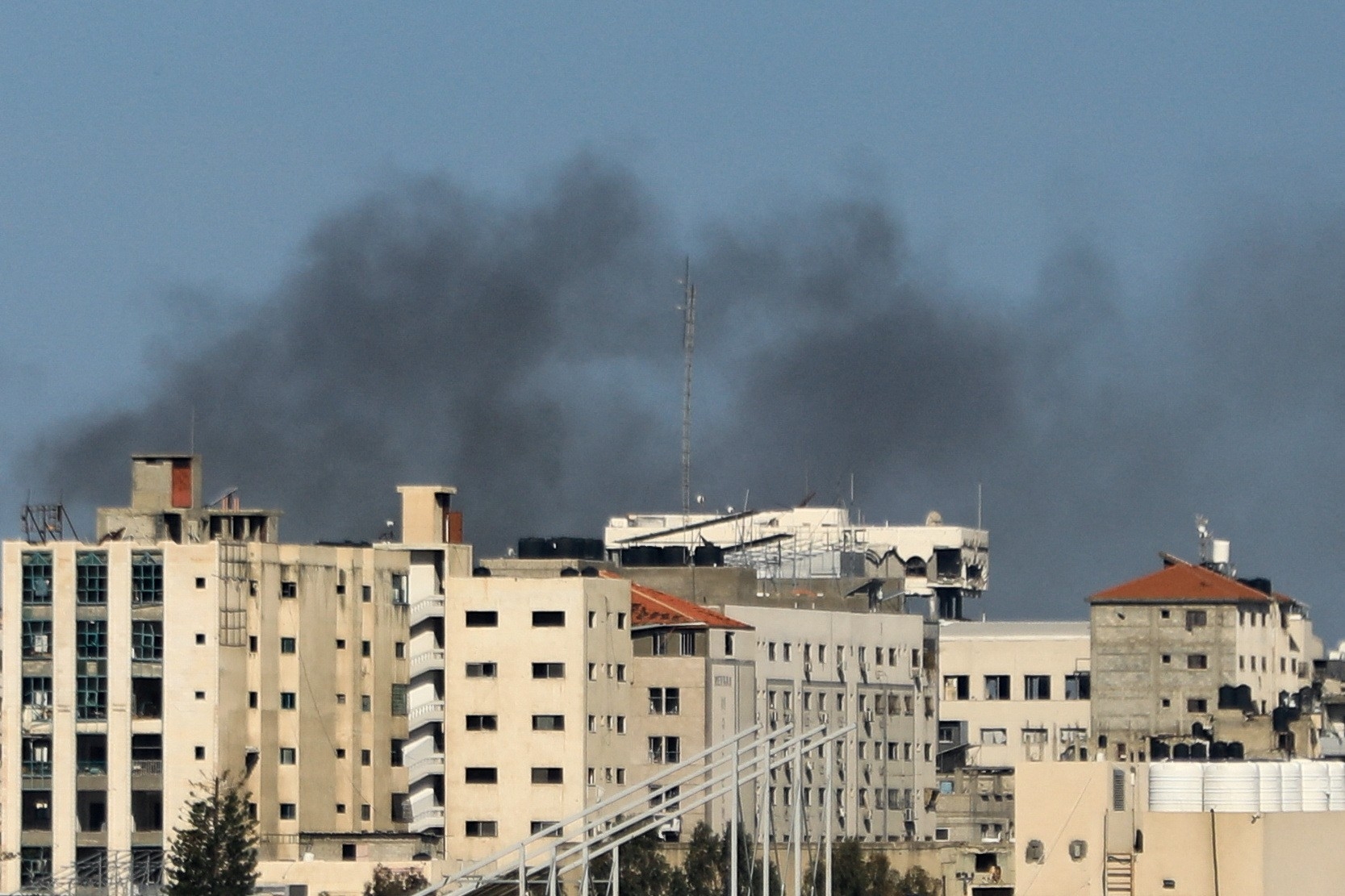 Smoke rises during an Israeli raid on al-Shifa hospital and the area around it, in Gaza City on 21 March 2024 (Reuters/Dawoud Abu Alkas)