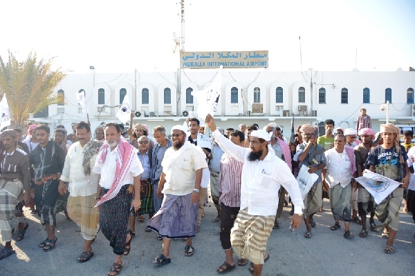Leaders of the Hadramout National Council celebrate taking control of Mukalla airport after the al-Qaeda withdrawal (MEE)