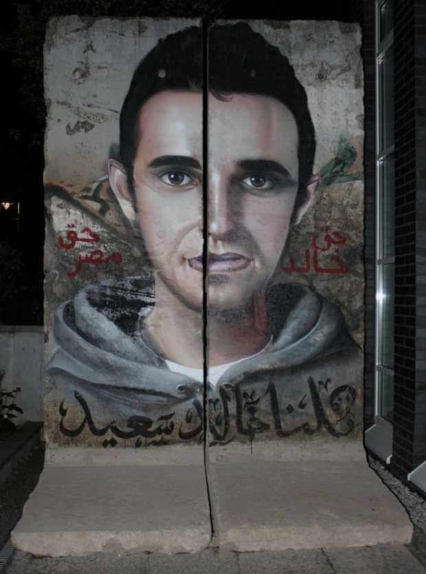 Images of Khaled Said, killed on 6 June 2014, were a common feature of street art in Egypt’s revolution (AFP)