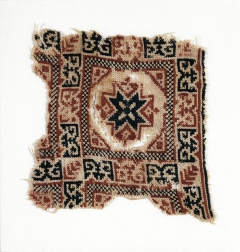 An older textile showing the Bethlehem star, one of the oldest patterns in Palestinian tatreez (Reproduced by permission of Interlink Publishing)