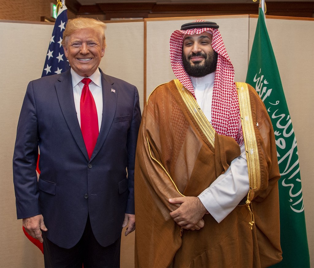Saudi Crown Prince Mohammed bin Salman poses for a photo with US President Donald Trump in Osaka, Japan, in 2019 (Bandar al-Jaloud/Saudi Royal Palace/AFP)
