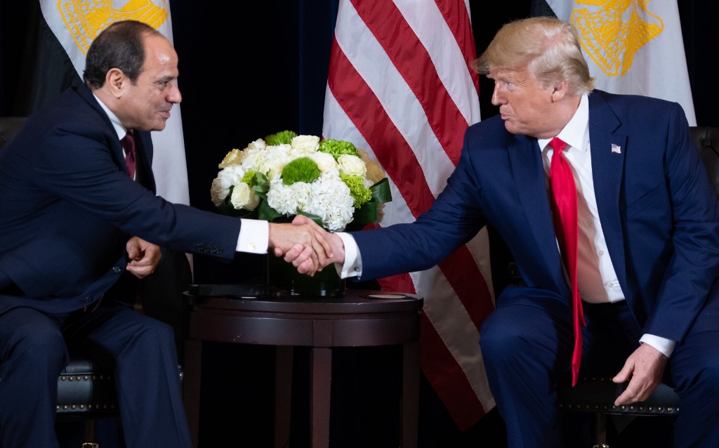 US President Donald Trump shakes hands with Egyptian President Abdel Fattah al-Sisi in New York in 2019 (AFP)