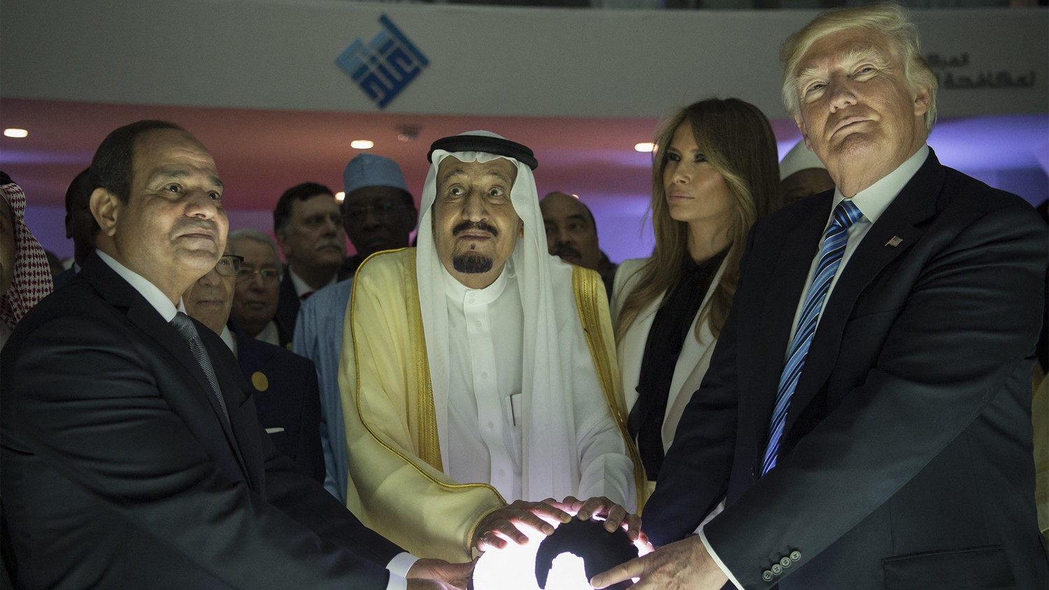 US President Donald Trump (R) posing for a picture with Egyptian President Abdel Fattah el-Sisi (L) and Saudi Arabia's King Salman in Riyadh.