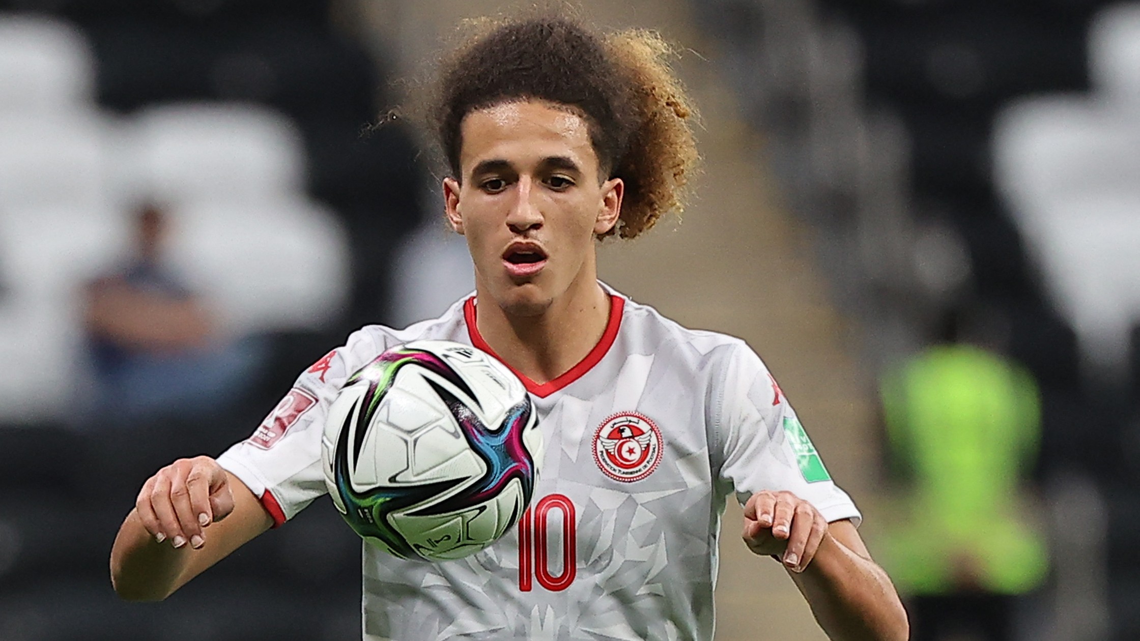 Tunisian midfielder Hannibal Mejbri controls the ball during the FIFA Arab Cup 2021 group B football match against Syria on 3 December, 2021 (AFP)