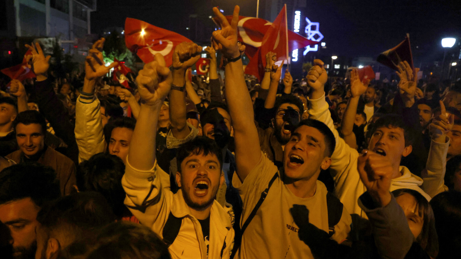 Supporters of Kemal Kilicdaroglu outside the CHP headquarters in Ankara on 14 May 2023 (Reuters)