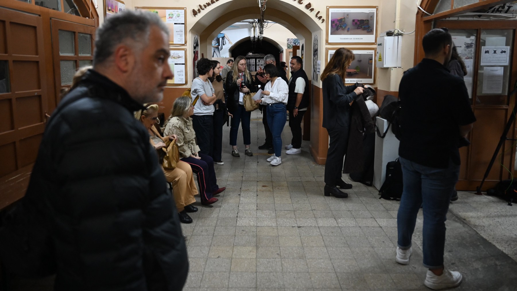 People wait to cast their ballots at a polling station in Istanbul on 28 May 2023 during the presidential elections (AFP)