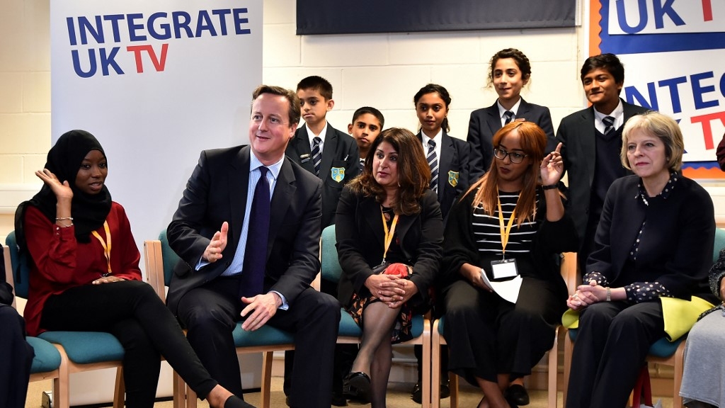 David Cameron (2nd L) and Theresa May (r) pictured at a Luton school where they announced a new government counter-extremism strategy in 2015 (AFP)