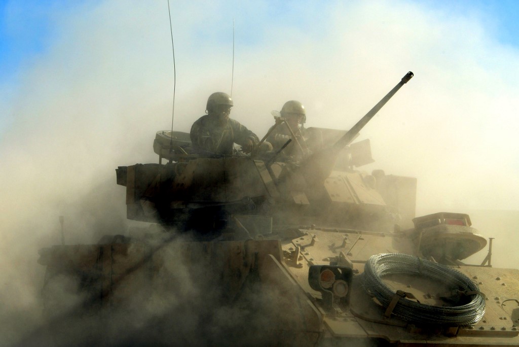 US troops leave their base in Tikrit, Iraq, in November 2003 (AFP)