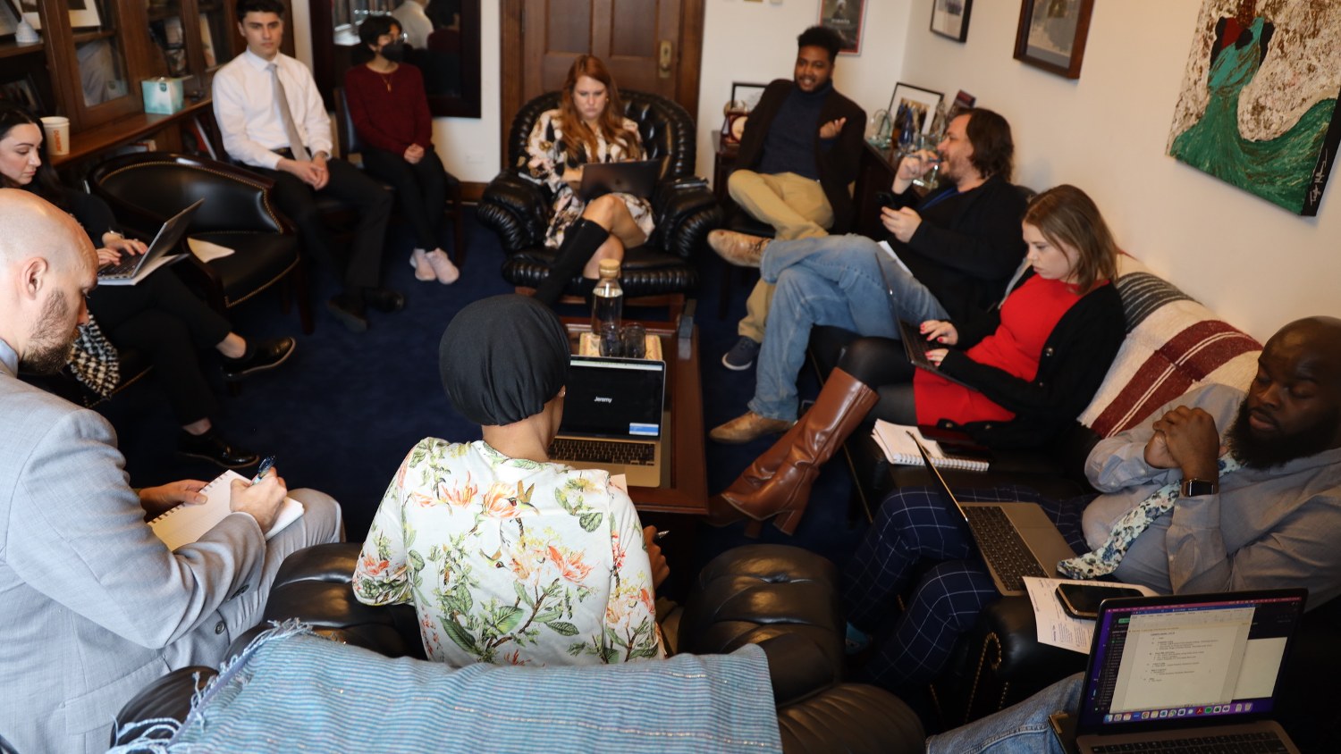 Congresswoman Ilhan Omar in a meeting with members of her staff.