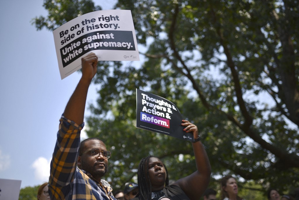 Protesters denounce white supremacy in Washington on 6 August 2019 (AFP)