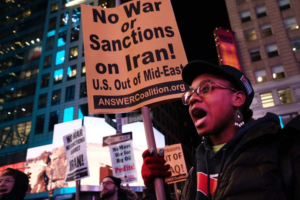 People protest against a US military conflict with Iran in New York on 8 January (AFP)