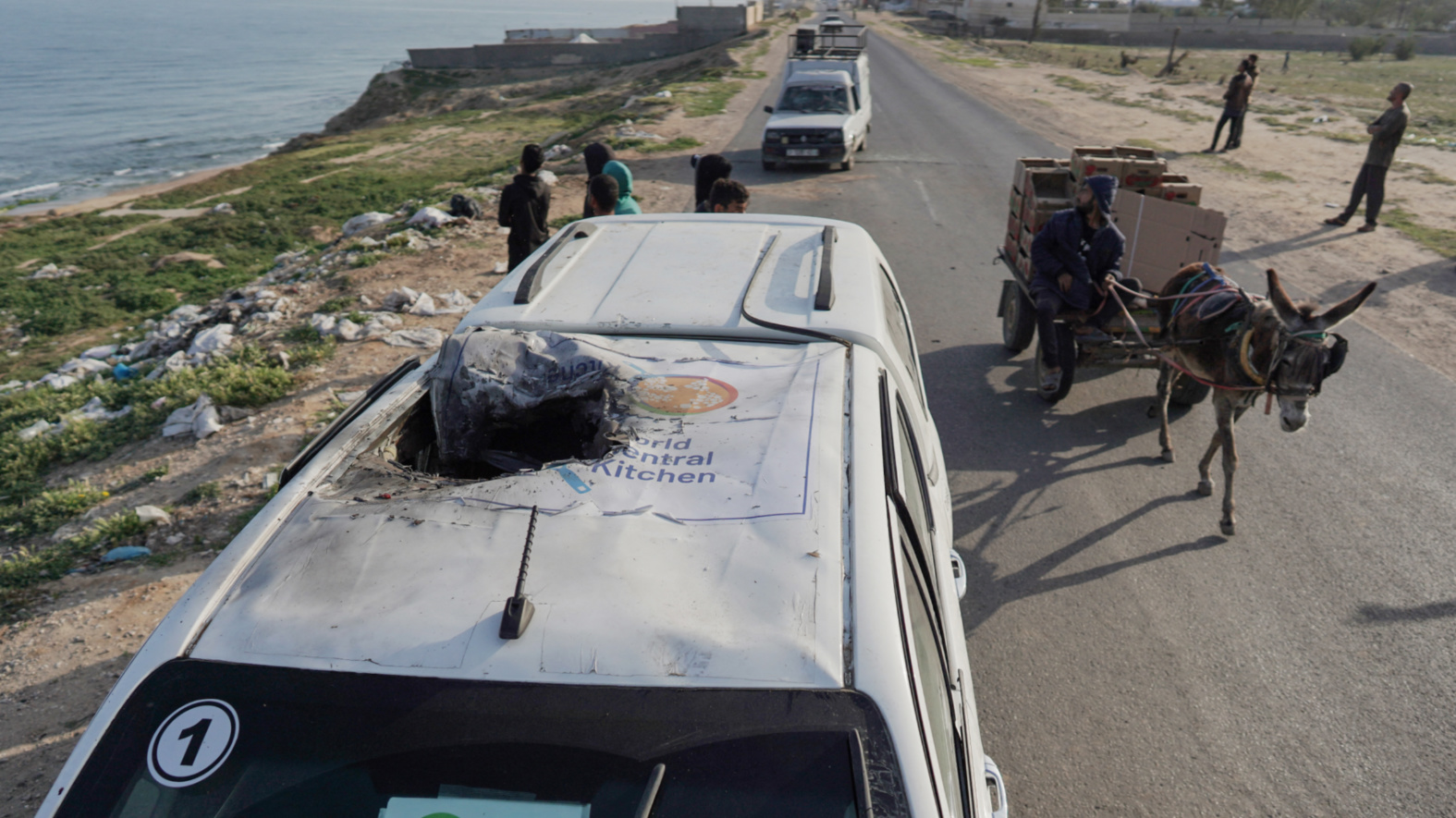 Aftermath of the Israeli strike on a World Central Kitchen (WCK) convoy in Gaza on 2 April 2024 (AFP)