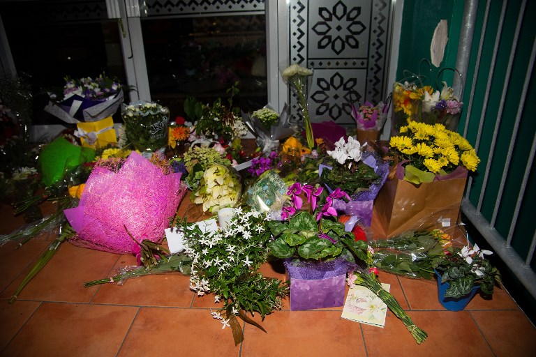 Flowers are placed on the front steps of a mosque in Wellington, New Zealand, on 15 March, to pay tribute to the victims in Christchurch (AFP)