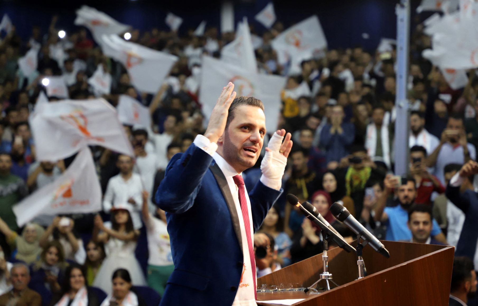 Shaswar Abdulwahid, the owner of Nalia Media Corporation and President of Newey Nwe (New Generation) Political Movement, addresses supporters (AFP)