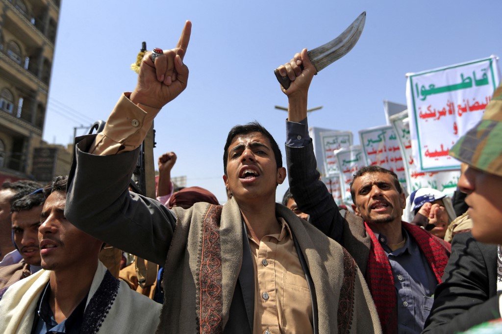 Supporters of the Houthi rebels gather in Sanaa on 23 August 2022 (AFP)