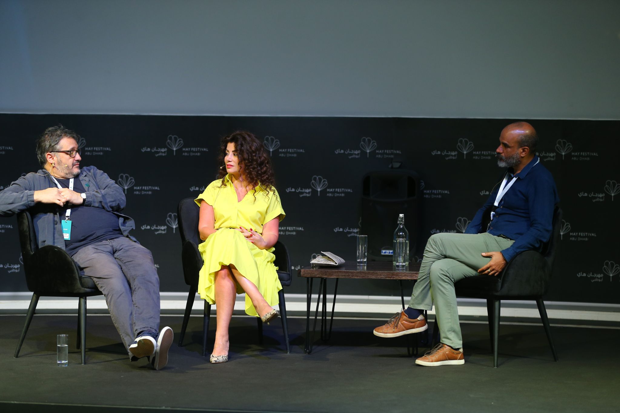 Youssef Rakha (R) with writer Joumana Haddad (C) and festival director Peter Florence (L) at the Hay Festival Abu Dhabi, February 2020 (Courtesy of The Hay Festival)